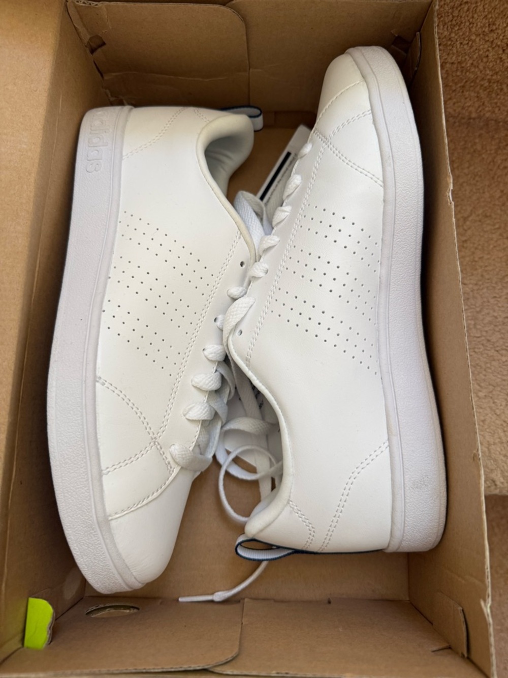 adidas Men’s White Low-Top Leather Sneakers display model